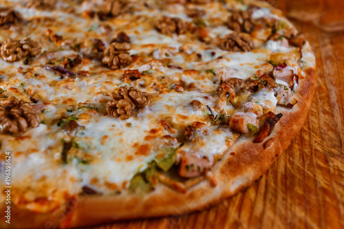 pizza on wooden background