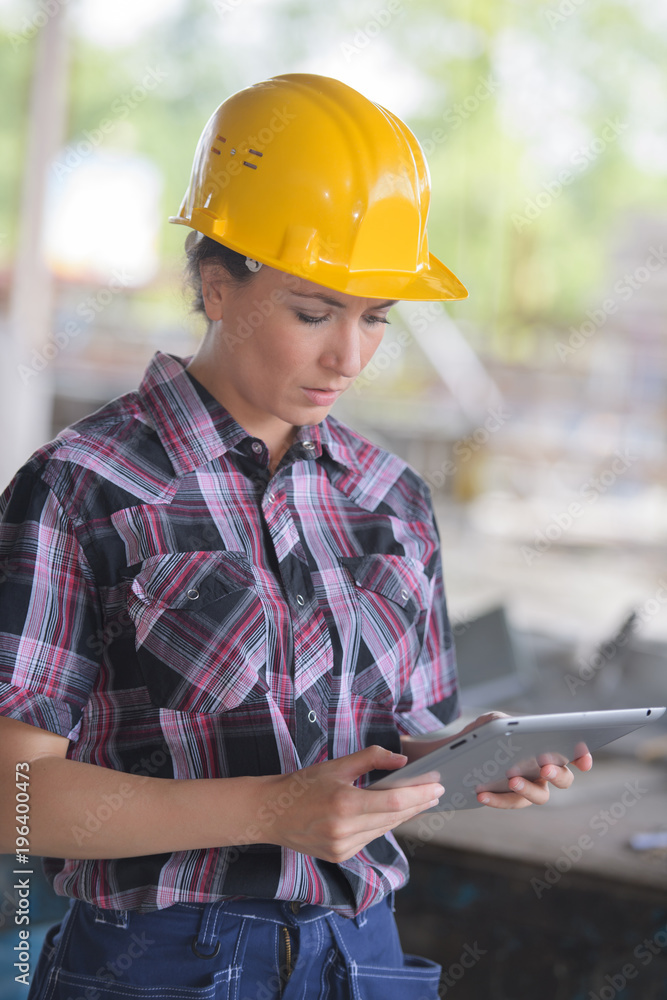 female worker using a tablet female worker using a tablet