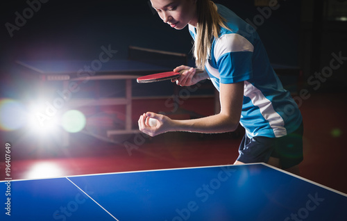 beautiful russian woman playing table tennis