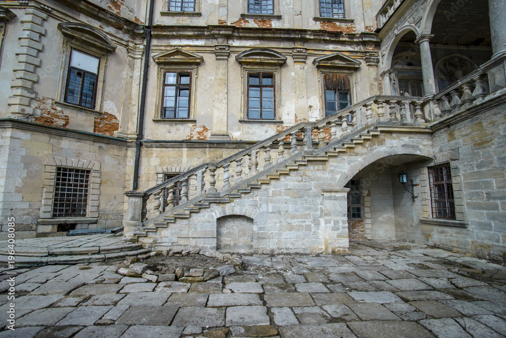 A castle yard. Inner yard of a castle with walls and stairs. 