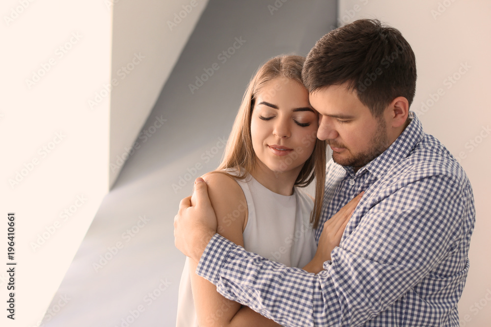 Portrait of young lovely couple at home Portrait of young lovely couple at home