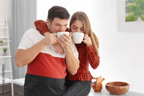 Cute young lovely couple dr...