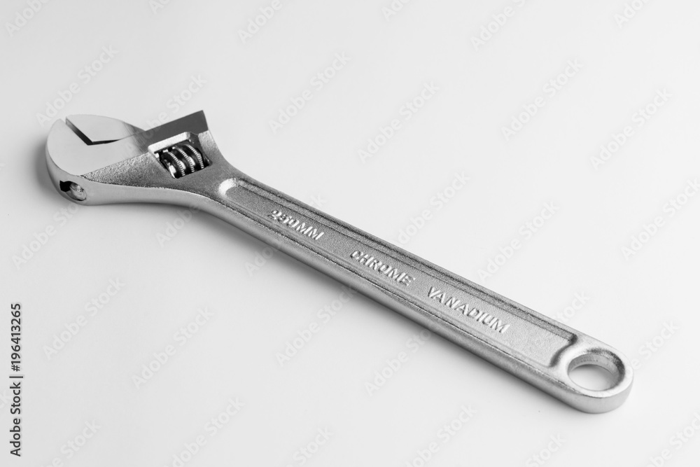 Adjustable wrench on white background. Sliding wrench isolated on white Adjustable wrench on white background. Sliding wrench isolated on white