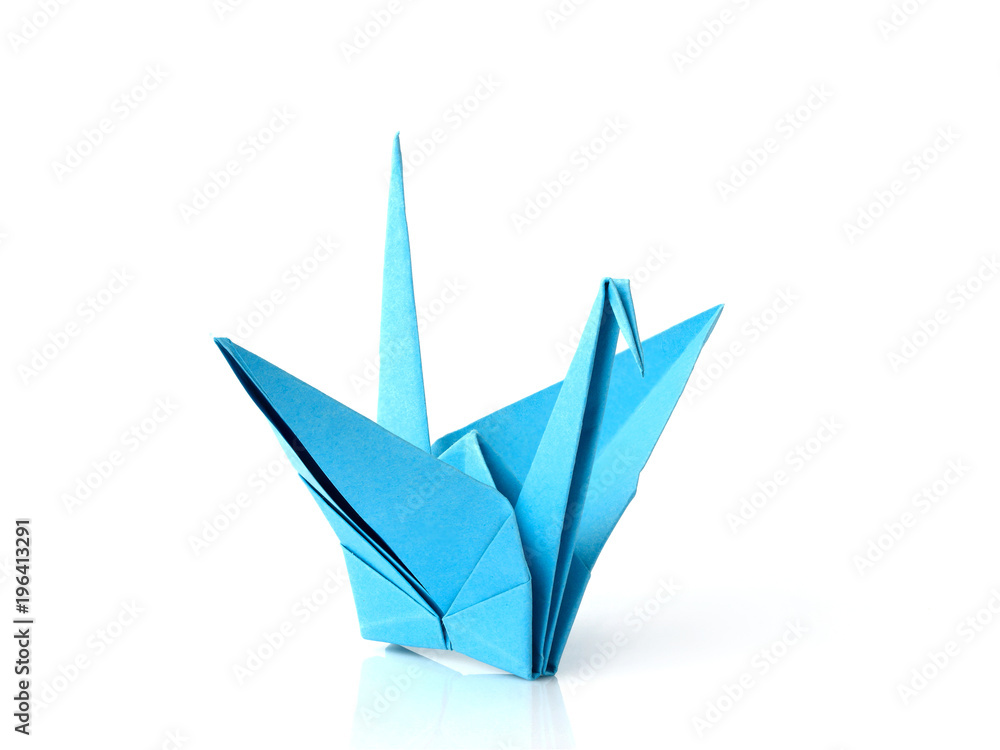 Blue origami crane isolated. Blue origami crane isolated.