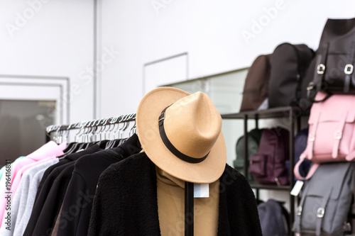 Fashion luxury casual clothes on the display shop. Fast fashion, mindfulness consumering photo