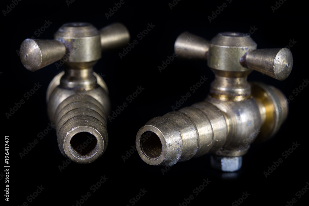 Old hydraulic valve. Garden accessories for watering vegetation.