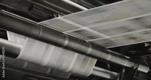 Tomorrow's newspapers are printed on a high speed printing press.