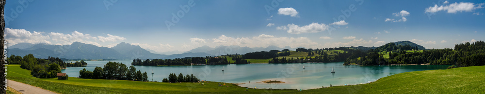 Panoramic view over lake forggensee near fuessen in bayern germany