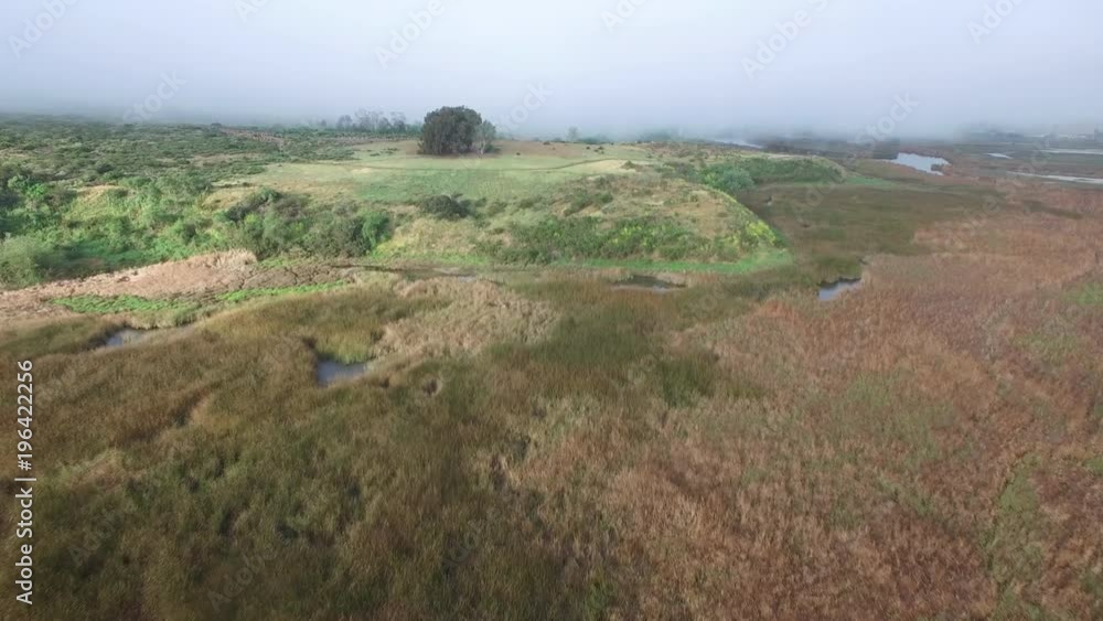 An aerial over an estuary near the coast north of San Diego, California. An aerial over an estuary near the coast north of San Diego, California.
