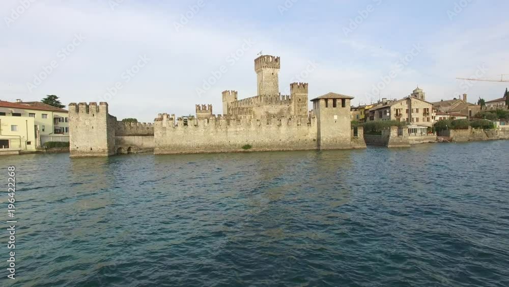 erial view. The Scaliger Castle in Sirmione. Lake Garda, Italy. 4K. erial view. The Scaliger Castle in Sirmione. Lake Garda, Italy. 4K.