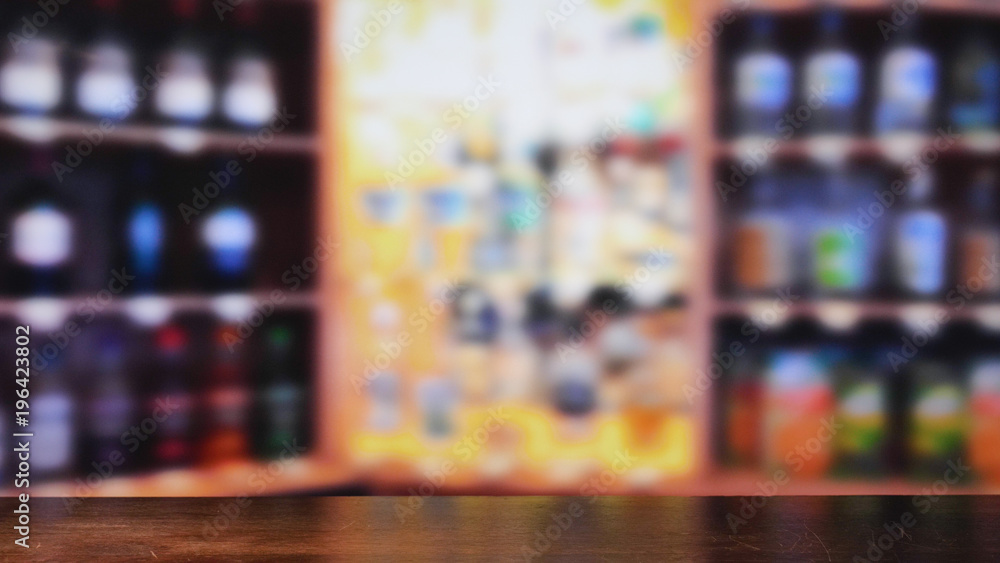 Bar counter, alcohol, blur background.