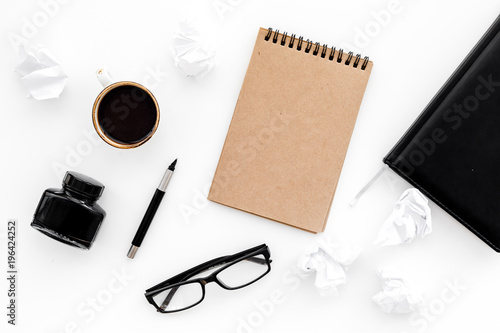 ink, dip pen, notebook, coffee, glasses for writer workplace set on white office background top view mock-up