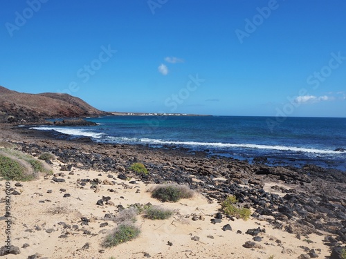 Sand dunes and volcanic shore on La Graciosa  Canary Islands