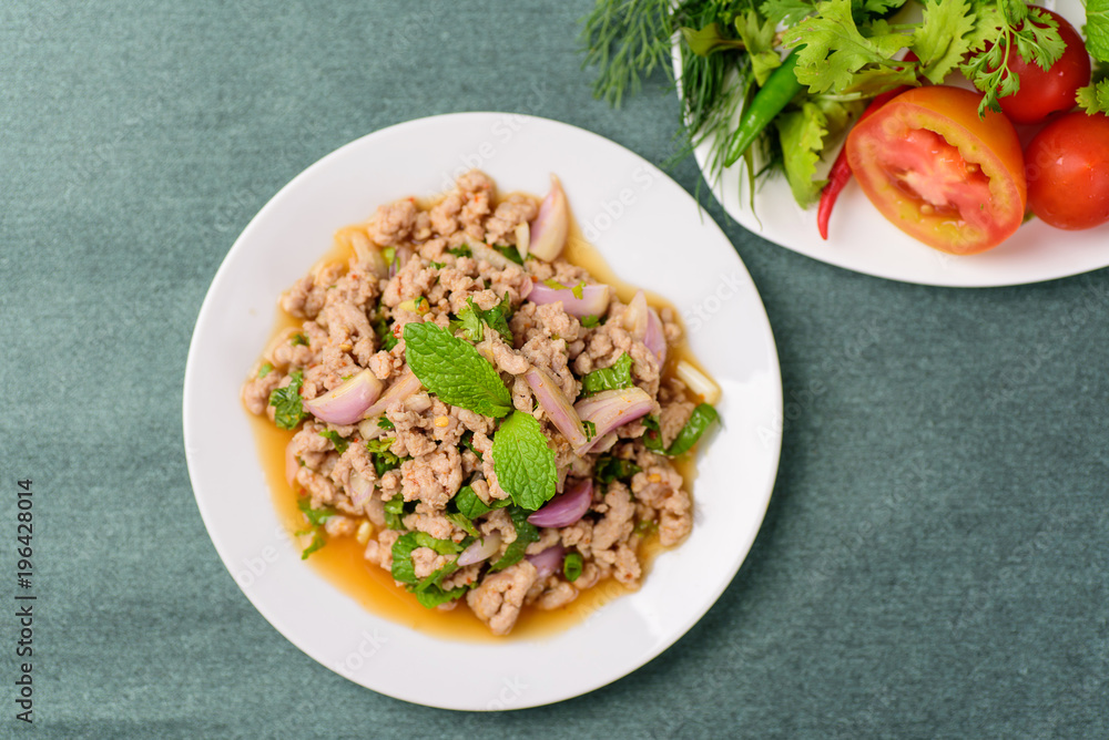 Thai food, spicy minced pork salad (Larb Moo), top view Thai food, spicy minced pork salad (Larb Moo), top view