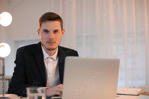 Young businessman working w...