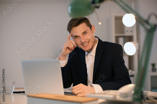 Young businessman working w...