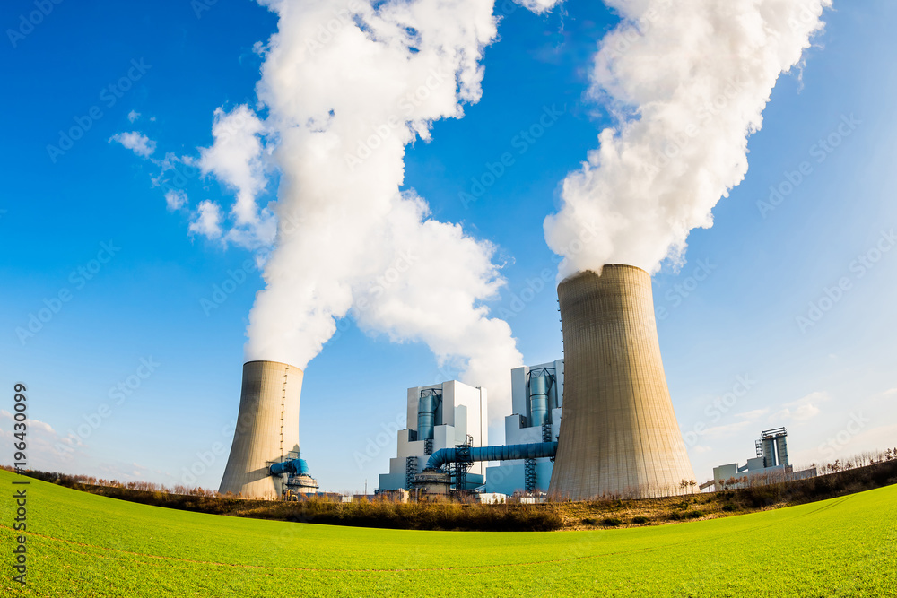 Power plant with two smoking cooling towers Power plant with two smoking cooling towers