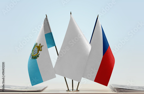 Flags of San Marino and Czech Republic with a white flag in the middle