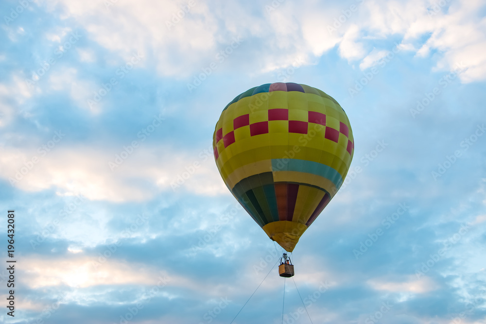 Fototapeta premium Hot air balloon in flight. It is a type of aircraft that can lifted by heating the air inside the balloon, usually with fire.