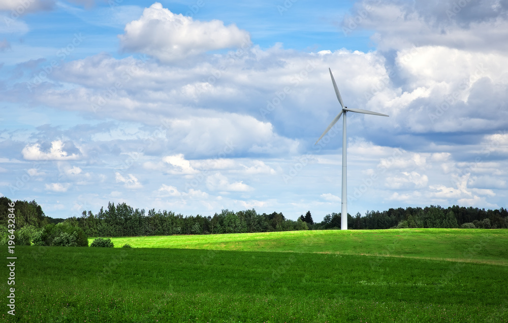 Windmill near of the green field. Environmental wind Windmill near of the green field. Environmental wind