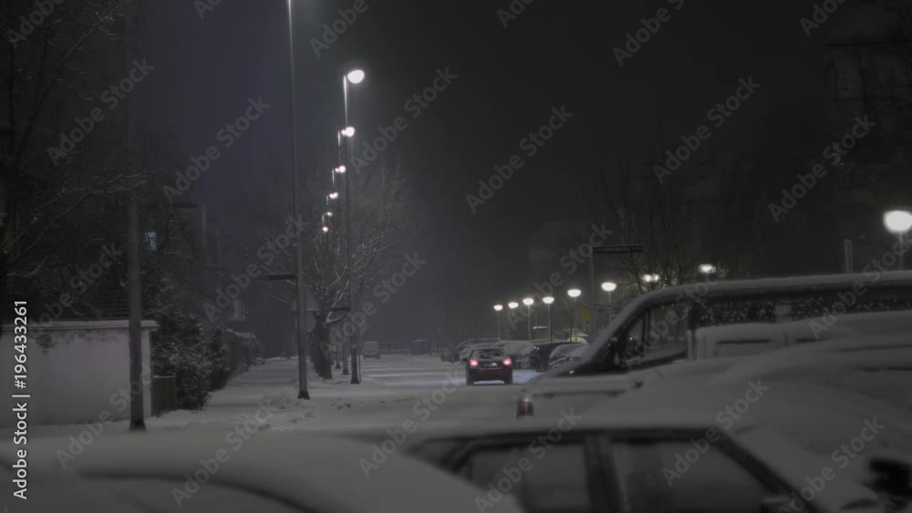 Snow falling in the city Snow falling in the city