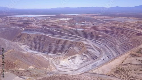 An aerial over a vast open pit strip mine in the Arizona desert. photo