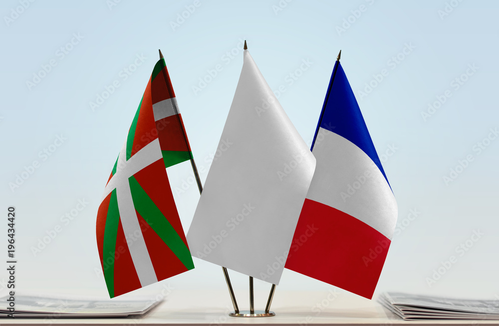 Flags of Basque Country and France with a white flag in the middle