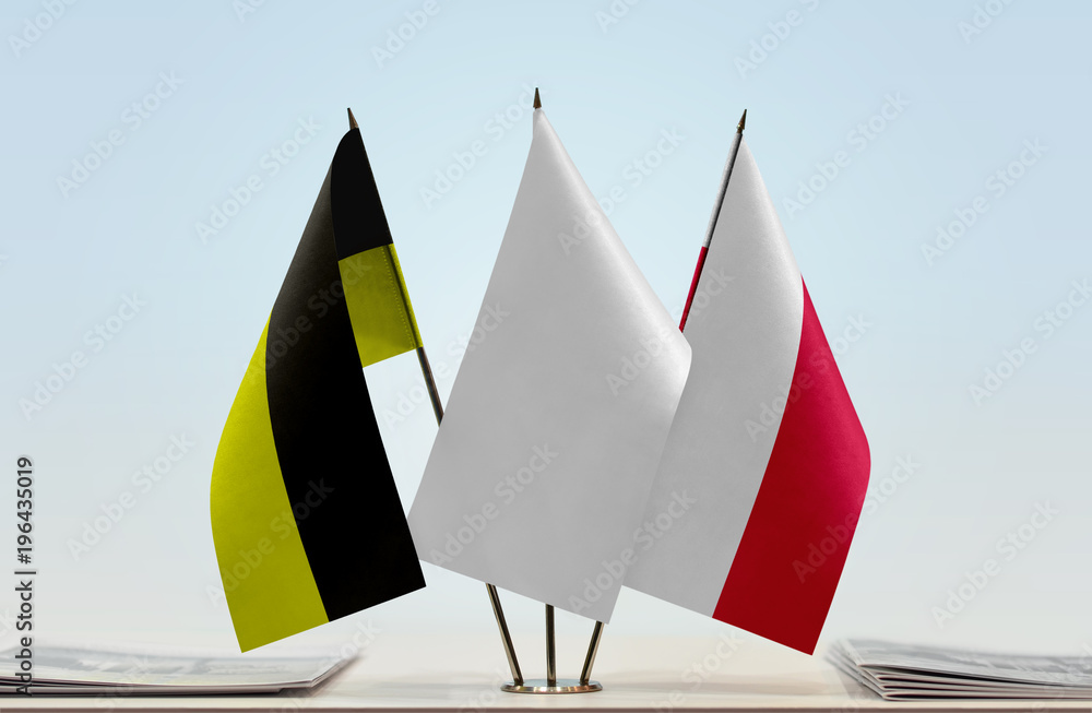 Flags of Kashubia and Poland with a white flag in the middle Stock