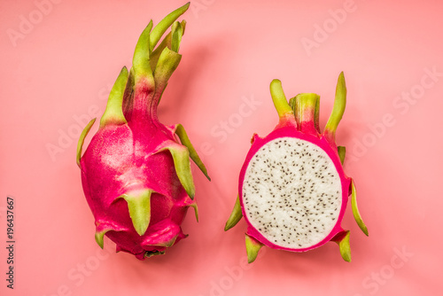 Creative layout made of pitahaya . Flat lay. Food concept. dragonfruit on pink background. photo