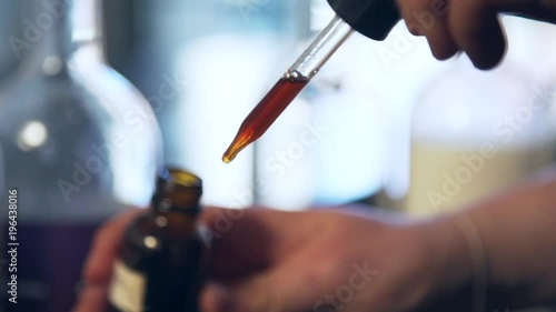 Cocktail tincture dropper at distillery