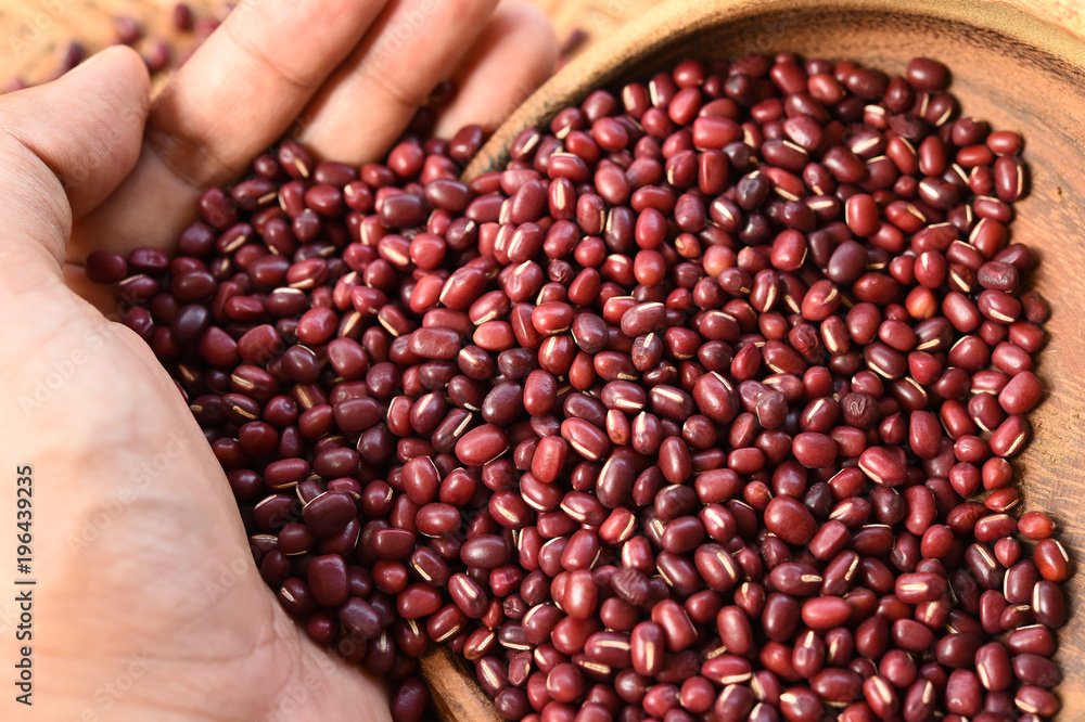 close up of red beans in wooden bowl close up of red beans in wooden bowl