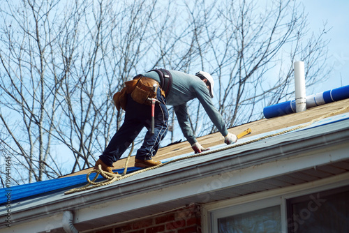 Wallpaper Mural Handyman working on repairing the roof Torontodigital.ca