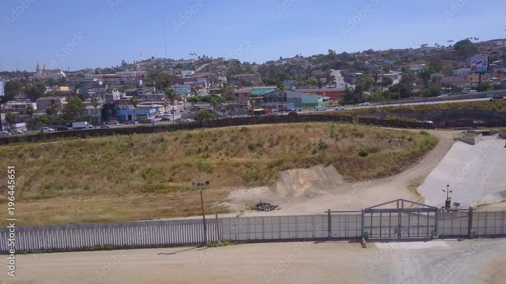 An aerial over the border wall fence separating the US from Mexico and San Diego from Tijuana. An aerial over the border wall fence separating the US from Mexico and San Diego from Tijuana.