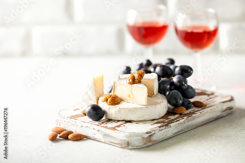 Brie cheese or Camembert with grapes