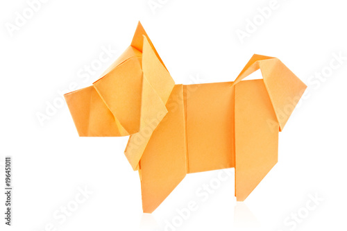 Orange dog chow-chow of origami  isolated on white background.