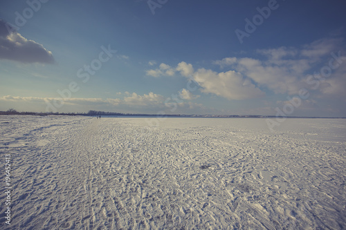 snow covered beach and sea