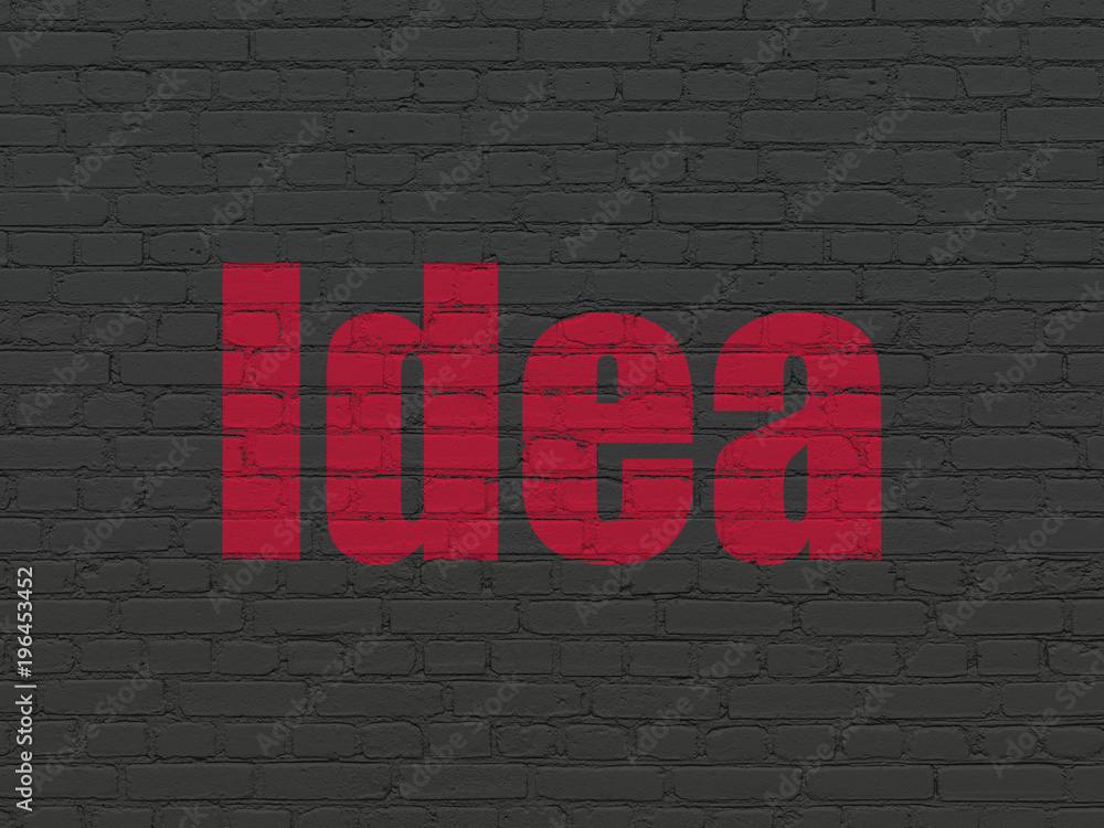 Marketing concept: Painted red text Idea on Black Brick wall background Marketing concept: Painted red text Idea on Black Brick wall background