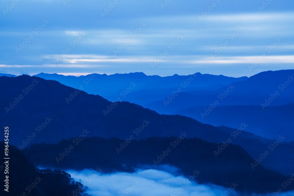 Blue mountains above a sea of clouds in Sagada, Mountain Province, Philippines