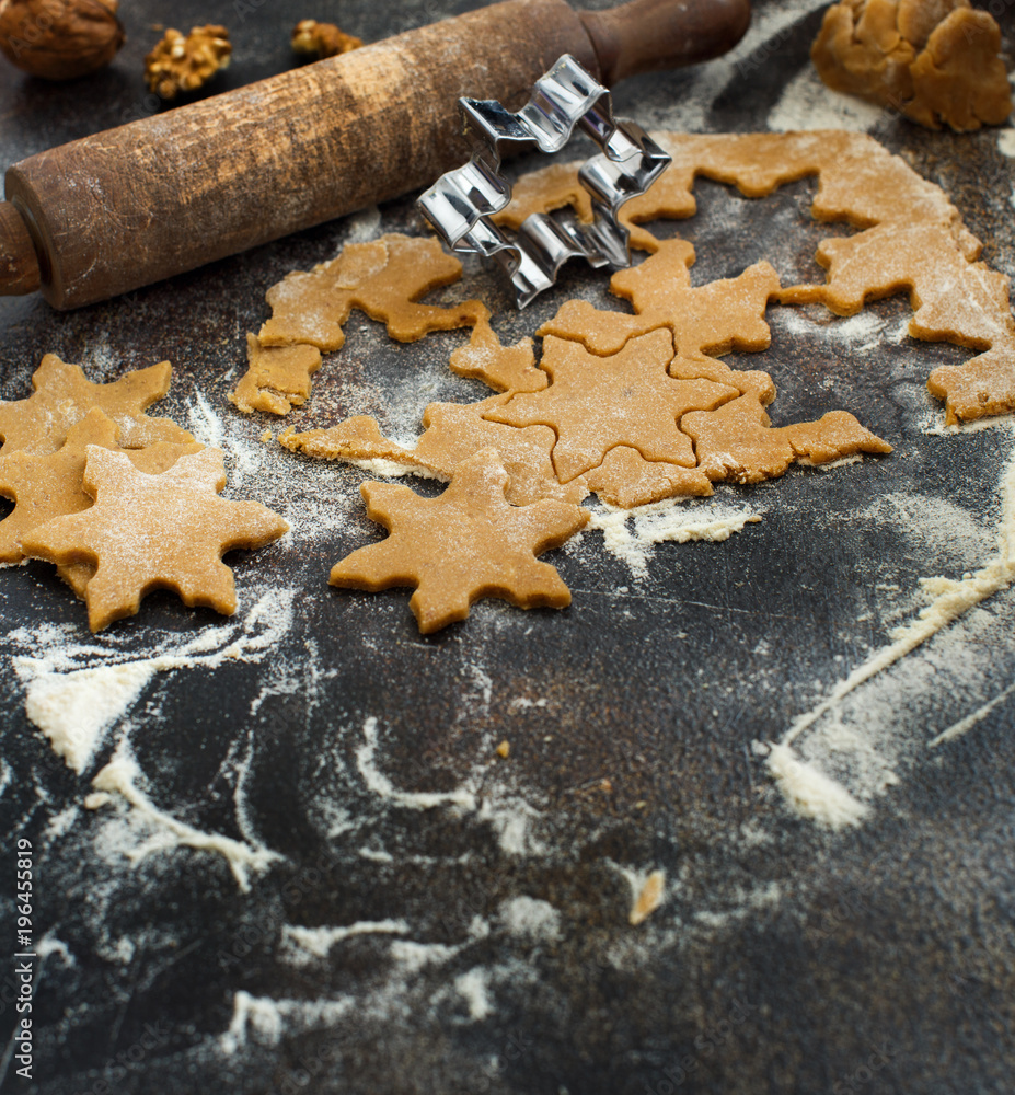 Cooking Christmas cookies with snowflake cookie cutters Cooking Christmas cookies with snowflake cookie cutters