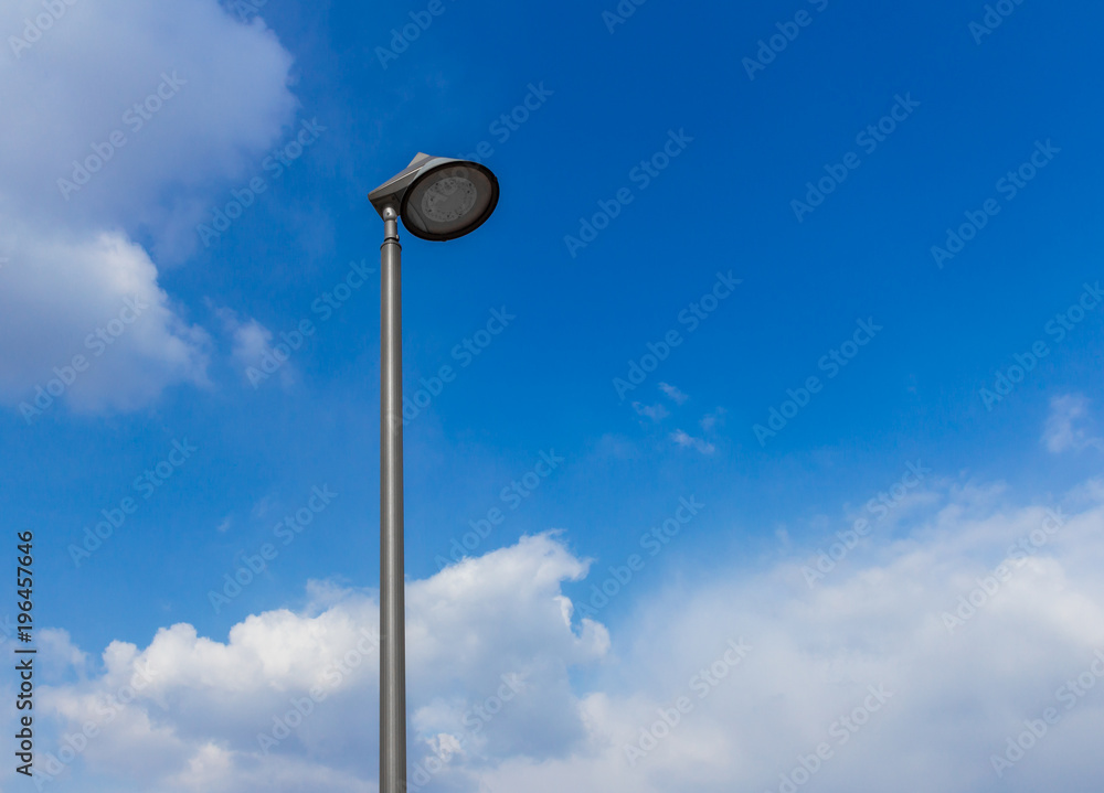Lamppost against the sky