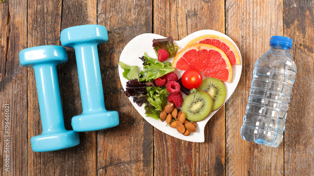 healthy eating and dumbbell - obrazy, fototapety, plakaty 