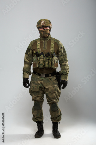 Photo of military man in camouflage