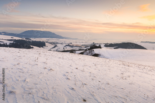 Turiec region and view of Velka Fatra mountain range in winter.  