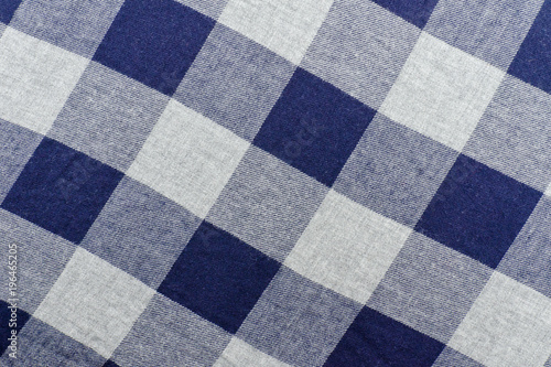 Checkered fabric. Gray and blue color. Close up