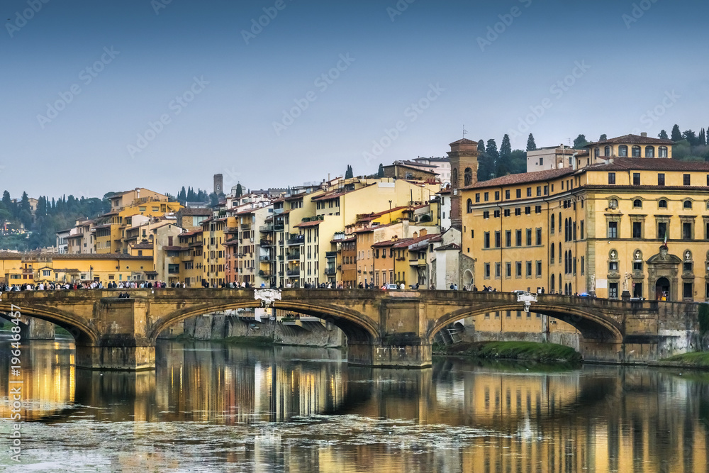 Tourists on the bridge over the river Arno, Florence, Italy