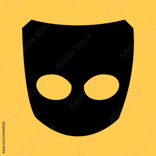 black mask on an orange background