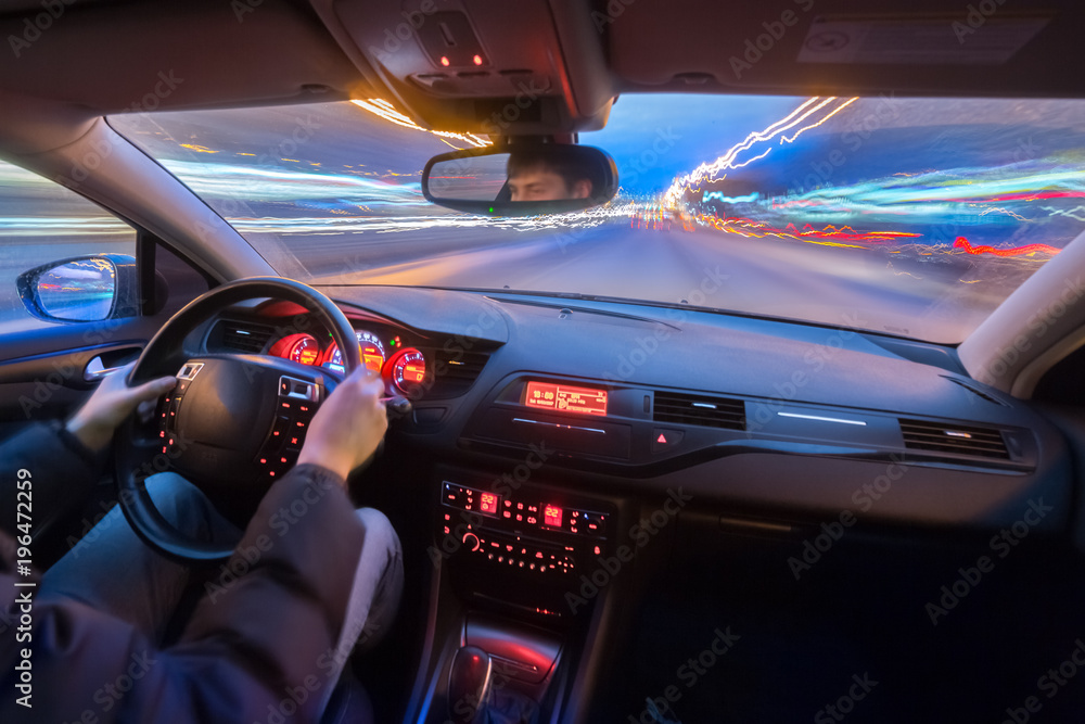 Night city road view from inside car