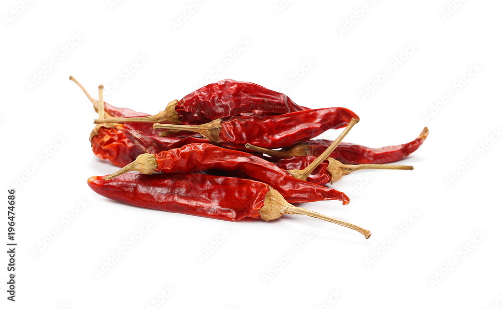 Dry red hot chili peppers, pile isolated on white background Dry red hot chili peppers, pile isolated on white background