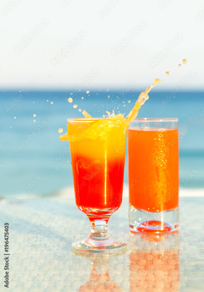 Two glasses of cocktail from freshly squeezed orange juice.