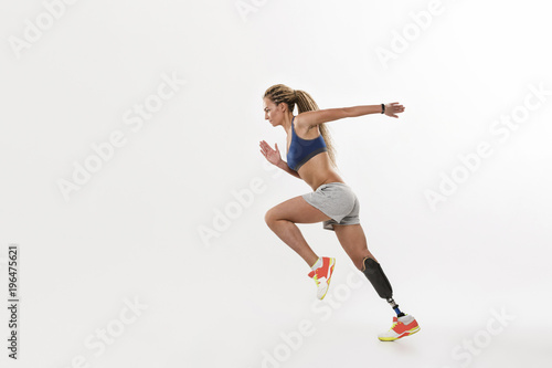 Full length portrait of a confident young disabled sportswoman